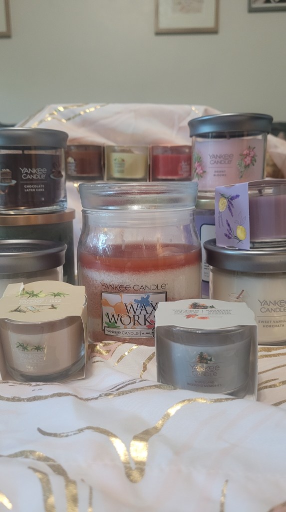 a selection of Yankee Candle products including a DIY candle